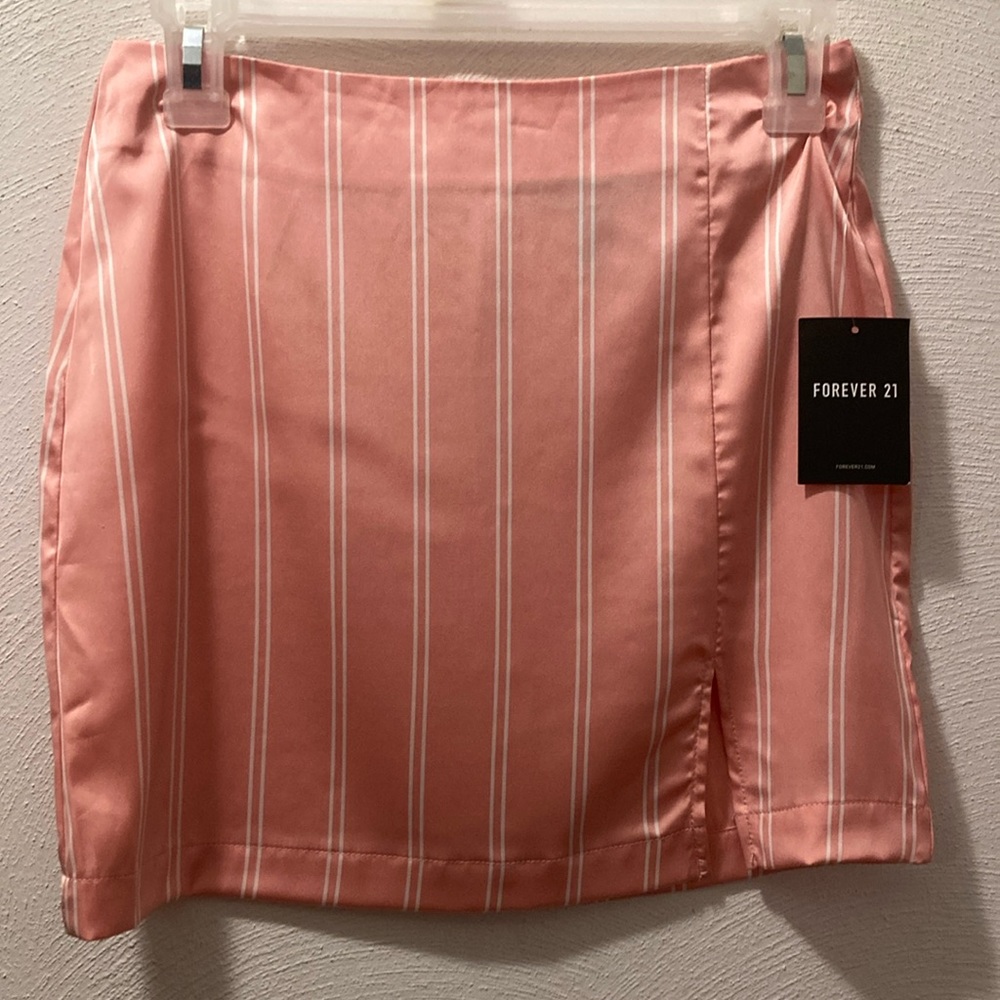 Pink silky mini skirt.   Forever 21